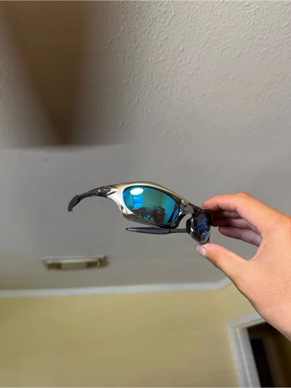 Silver Frame Sunglasses with Blue Mirrored Lenses Oakley